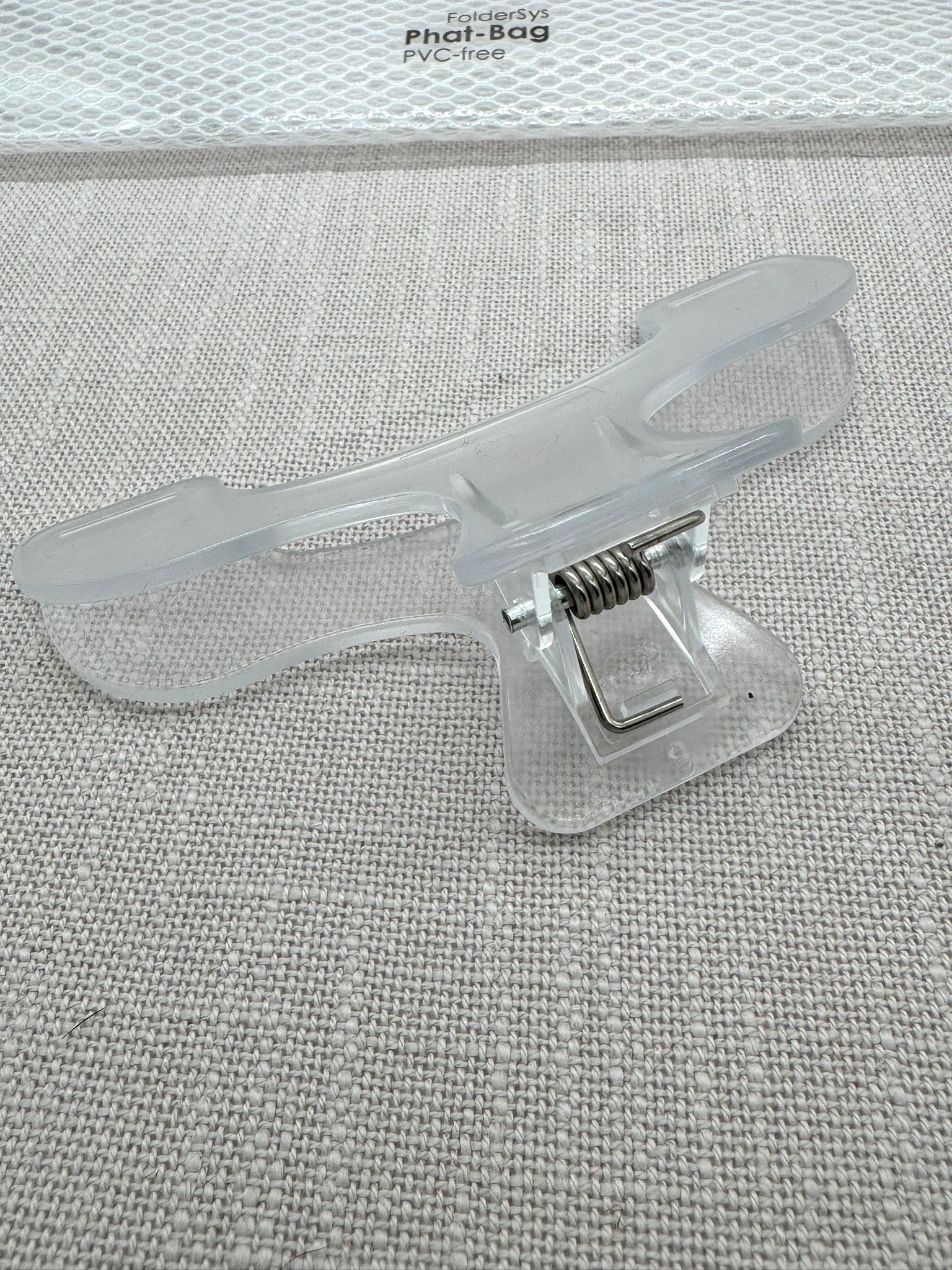 Transparente Buchklammer