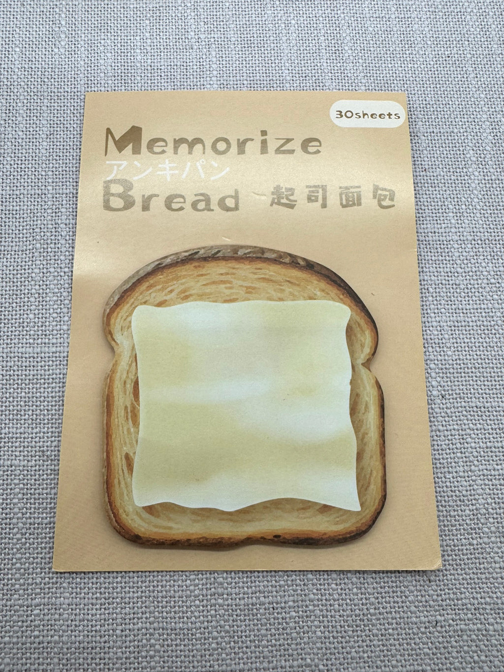 Haftnotizen in Form einer Scheibe Toastbrot. 
